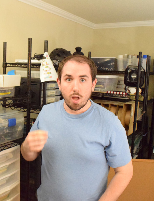 Me in the living room / warehouse. I'm pretty sure that's the same blue shirt from before.